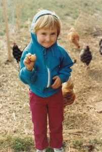 Here is one of our children with some fresh eggs! We are a family farm providing non-soy, non-GMO chicken feed to Denver and the Front Range.